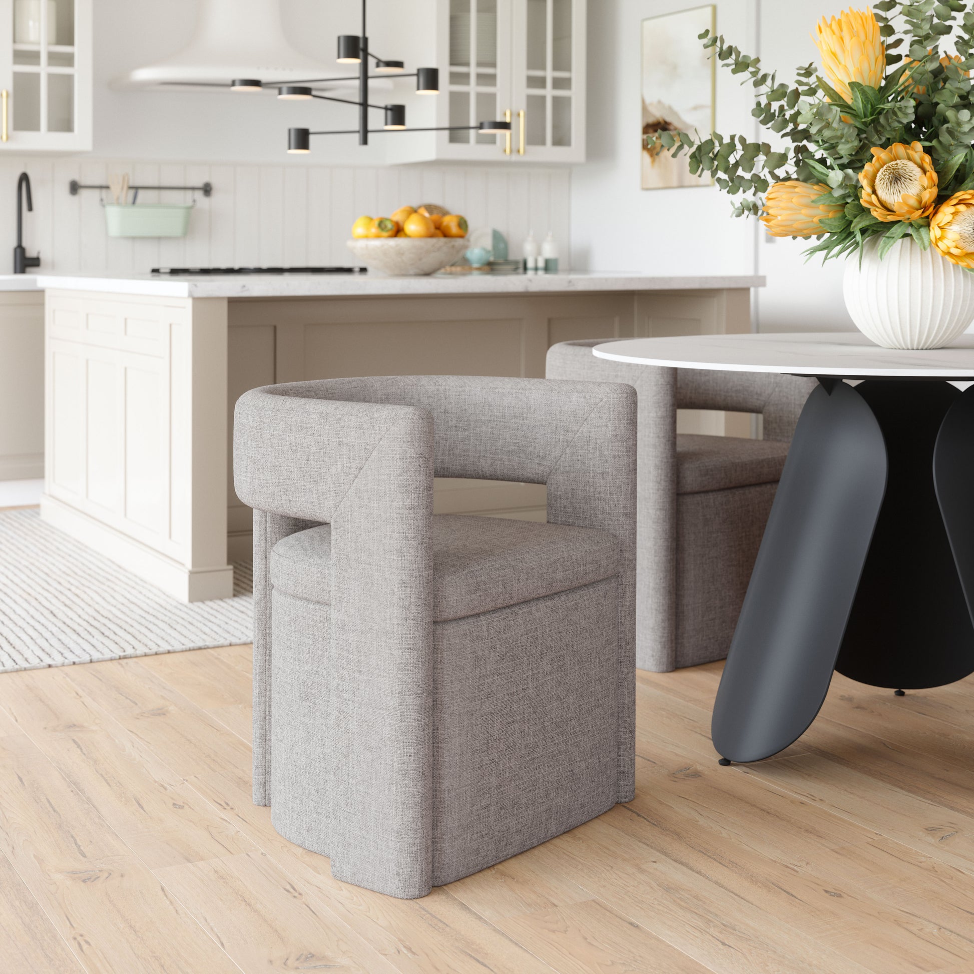 neutral-toned linen accent chair in a refined master bedroom setting