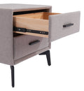 Gray upholstered nightstand with open wooden drawer on a white background
