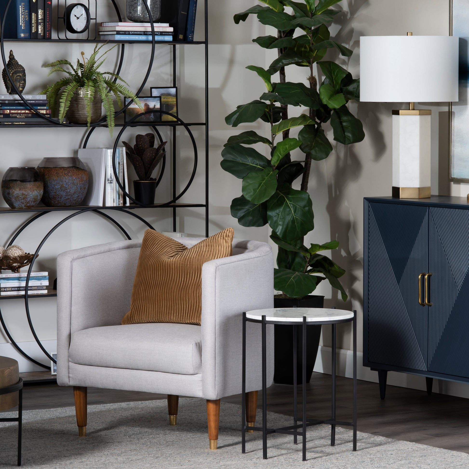 neutral-toned linen accent table in a elegant modern bedroom setting