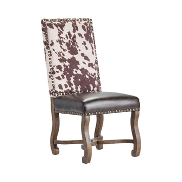 beige plush accent chair in a minimalist dining room setting