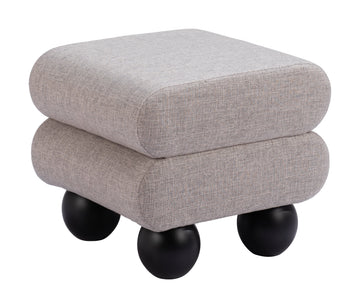 matte black linen ottoman styled in a minimalist elegant dining room