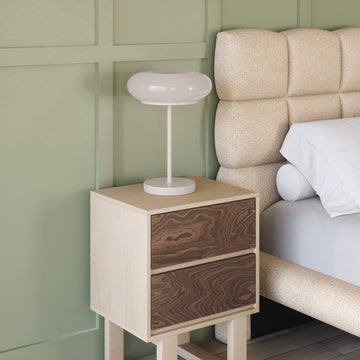 cream woven table lamp in a modern bedroom setting
