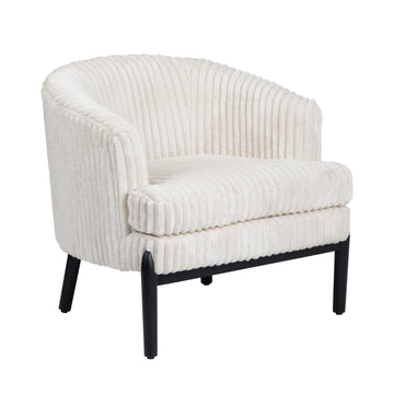 earth-toned fabric accent chair in a farmhouse contemporary bedroom setting