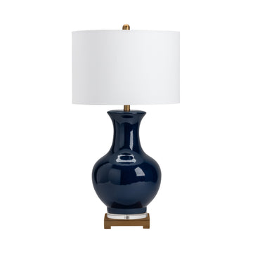warm-toned soft table lamp in a coastal guest room setting