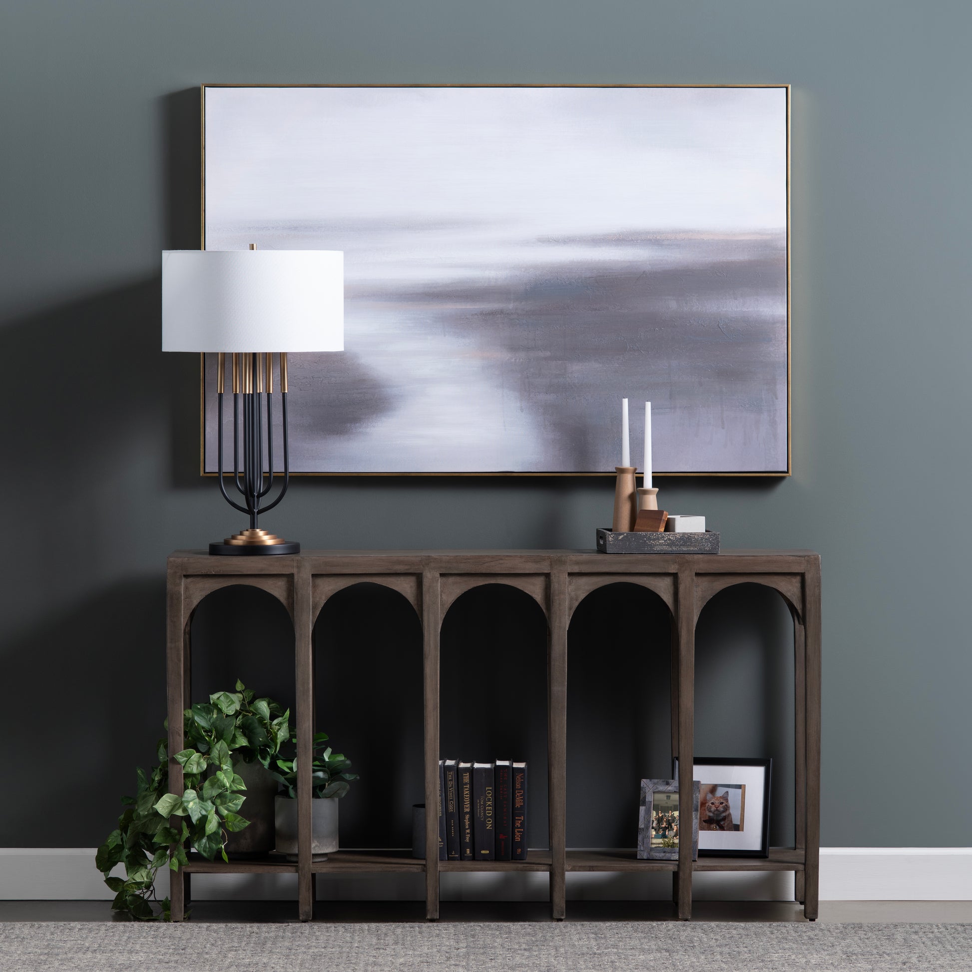 cream woven accent table in a elegant modern bedroom setting