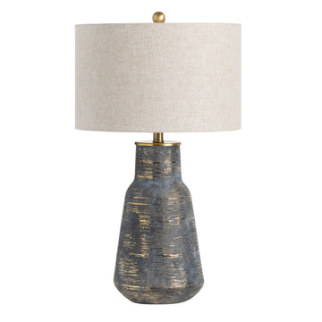 white brushed table lamp in a coastal guest room setting