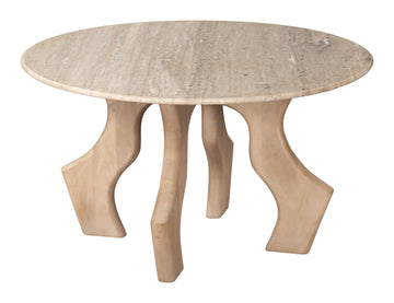 earth-toned marble coffee table styled in a transitional serene master suite