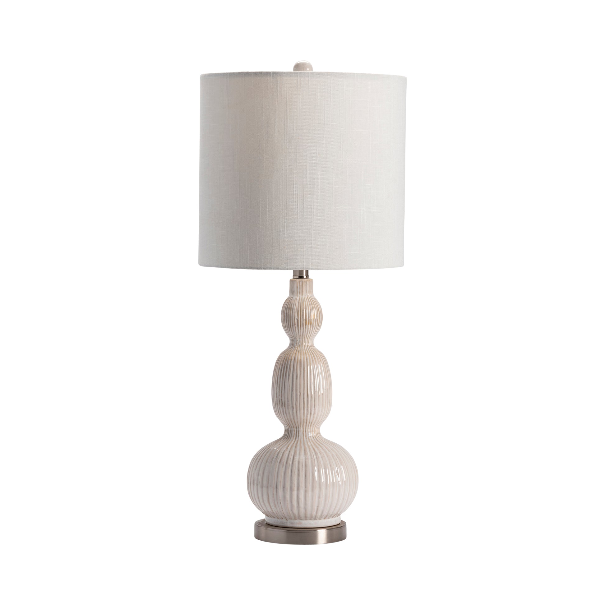 neutral-toned linen table lamp in a refined master bedroom setting