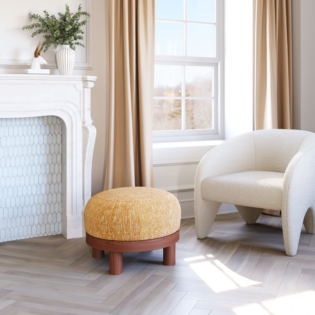 neutral-toned linen ottoman in a farmhouse contemporary bedroom setting