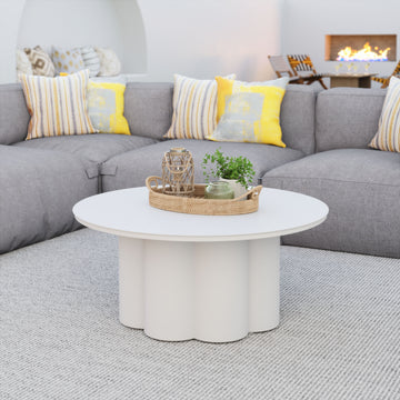 beige plush accent table in a elegant modern bedroom setting