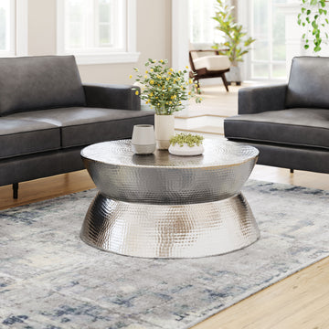 earth-toned fabric accent table in a transitional living room setting