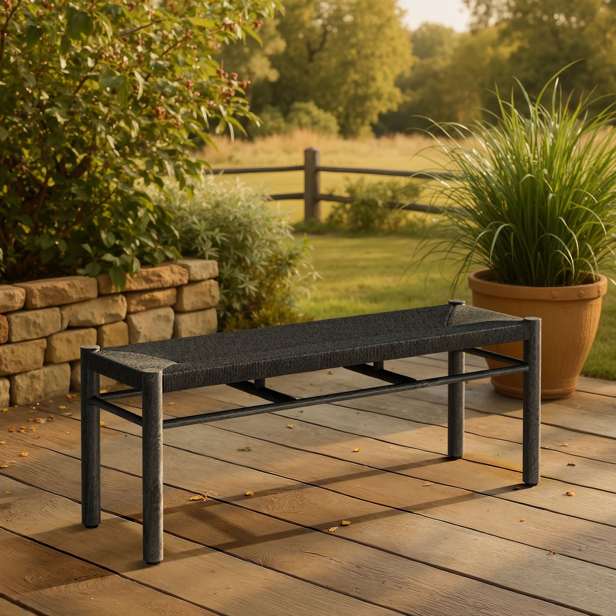 Iska Bench Black styled for a transitional patio space.