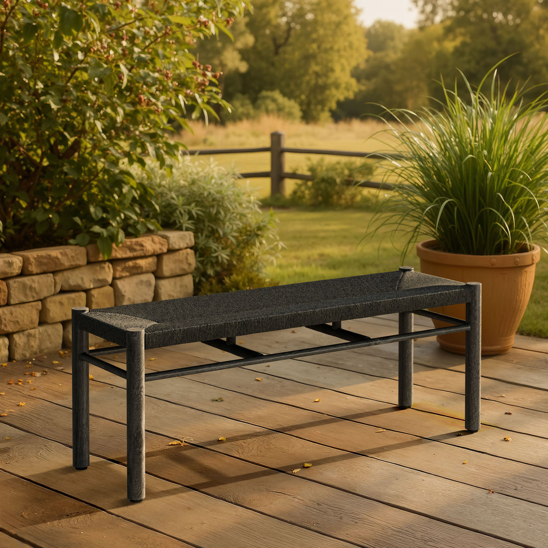 Iska Bench Black styled for a transitional patio space.