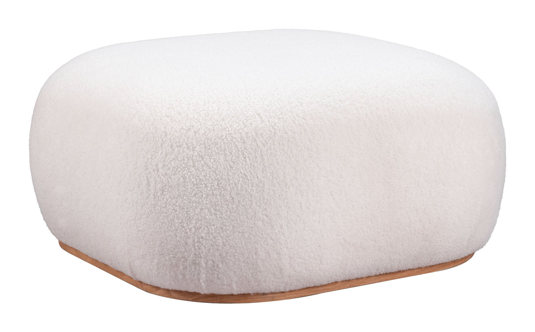 cream brushed metal ottoman styled in a contemporary minimalist entryway