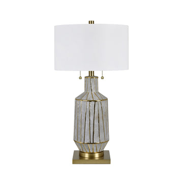 neutral-toned linen table lamp in a elegant modern bedroom setting