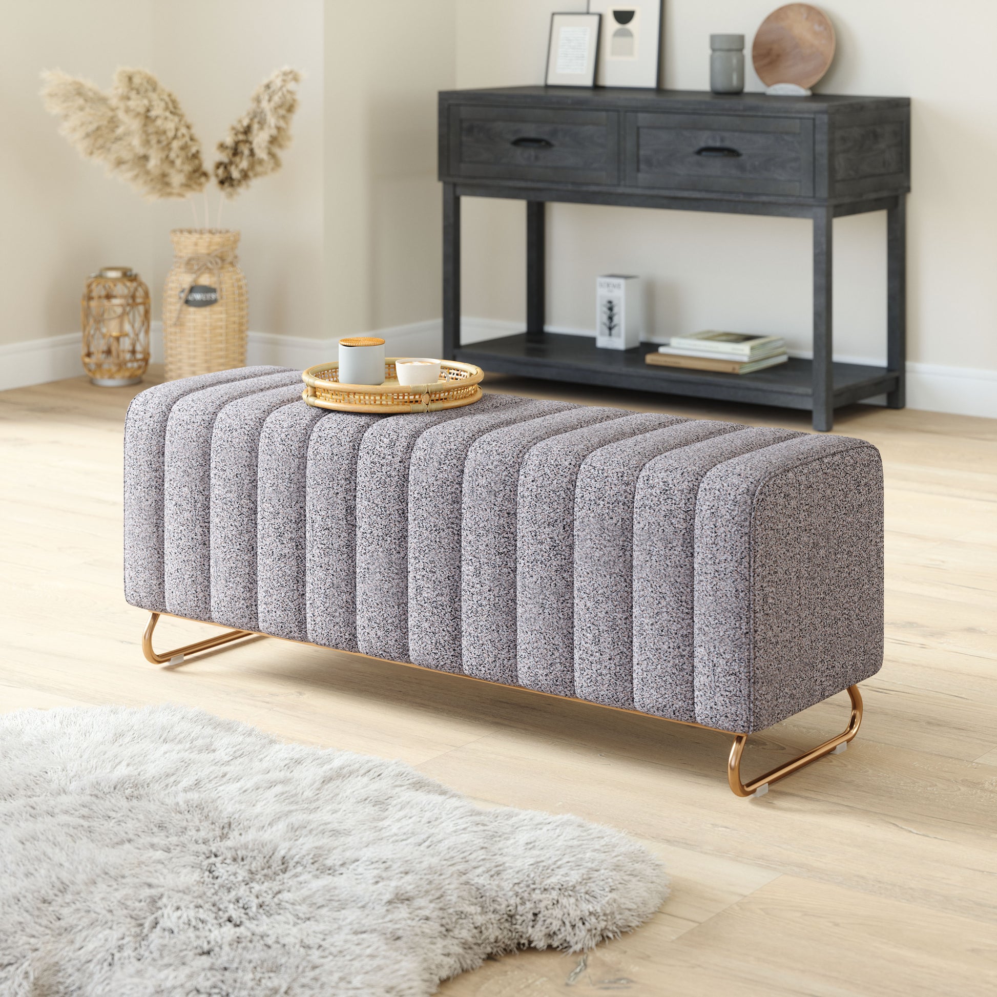 neutral-toned linen accent bench in a modern bedroom setting