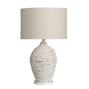 beige plush table lamp in a elegant modern bedroom setting