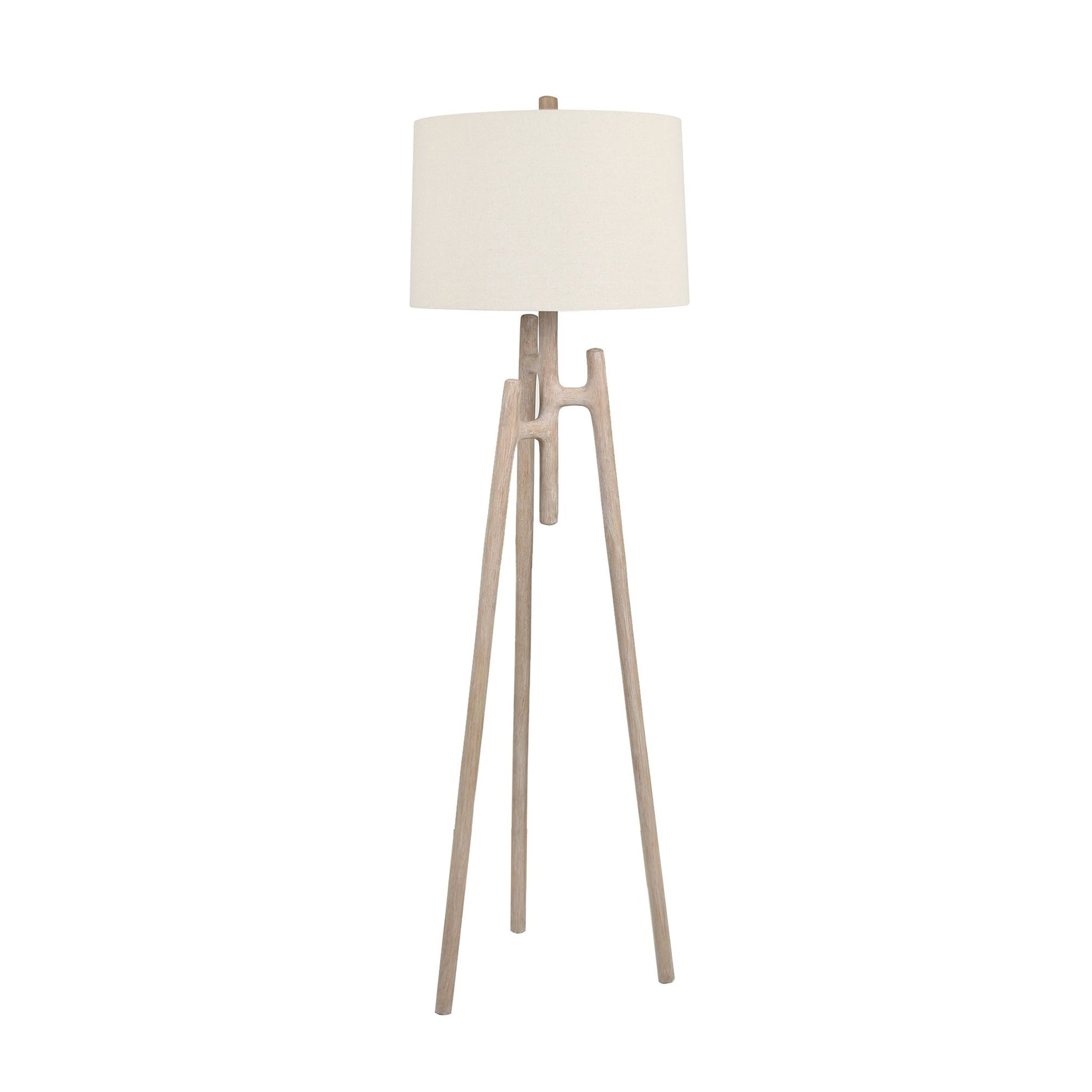 neutral-toned linen table lamp in a contemporary cozy bedroom setting