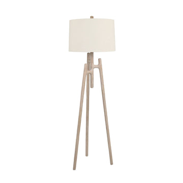 neutral-toned linen table lamp in a contemporary cozy bedroom setting