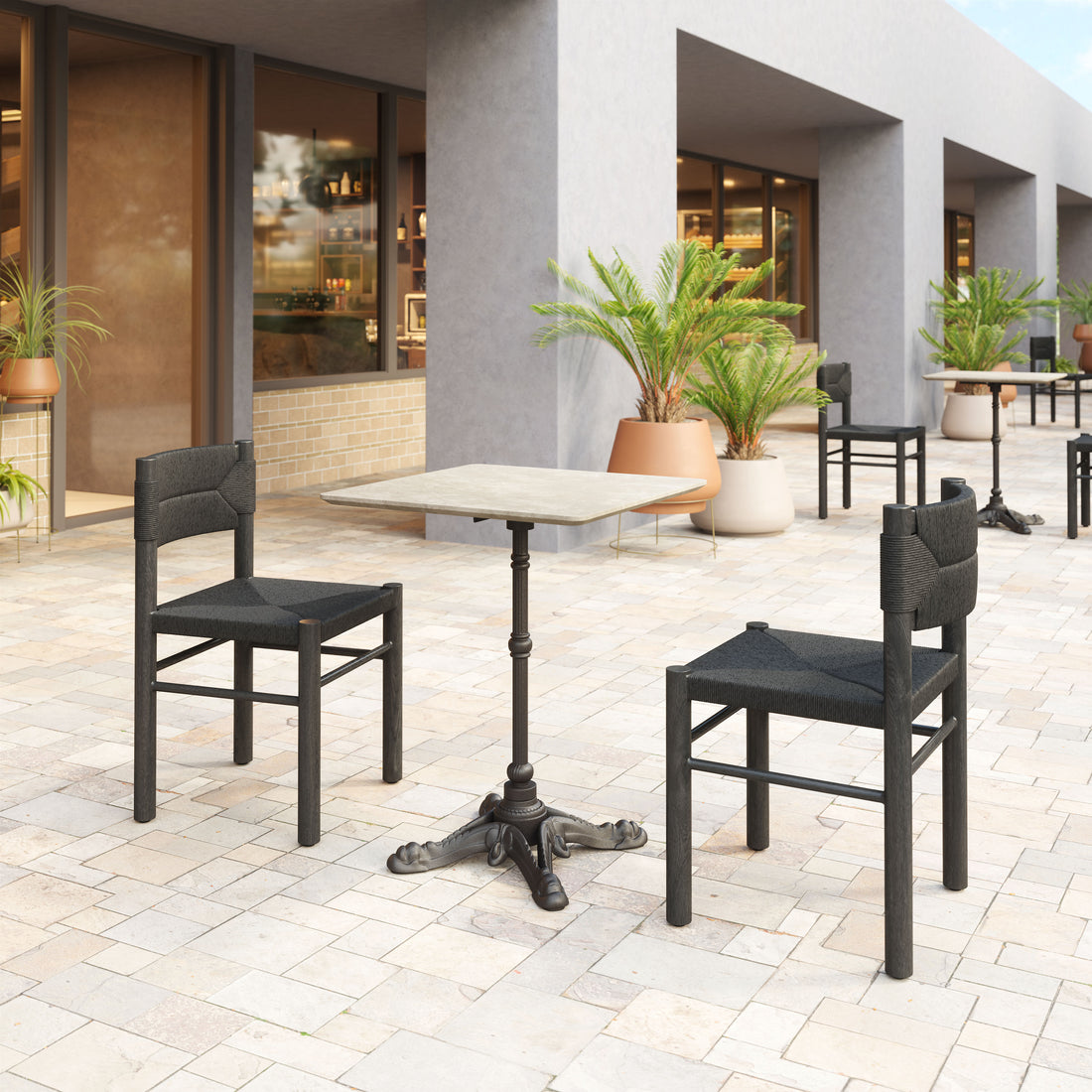 Iska Dining Chair (Set of 2) Black styled for a transitional patio space.