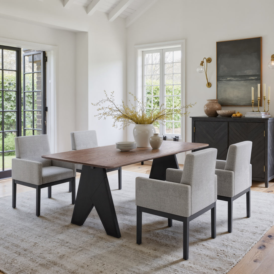 charcoal textured accent table in a transitional living room setting
