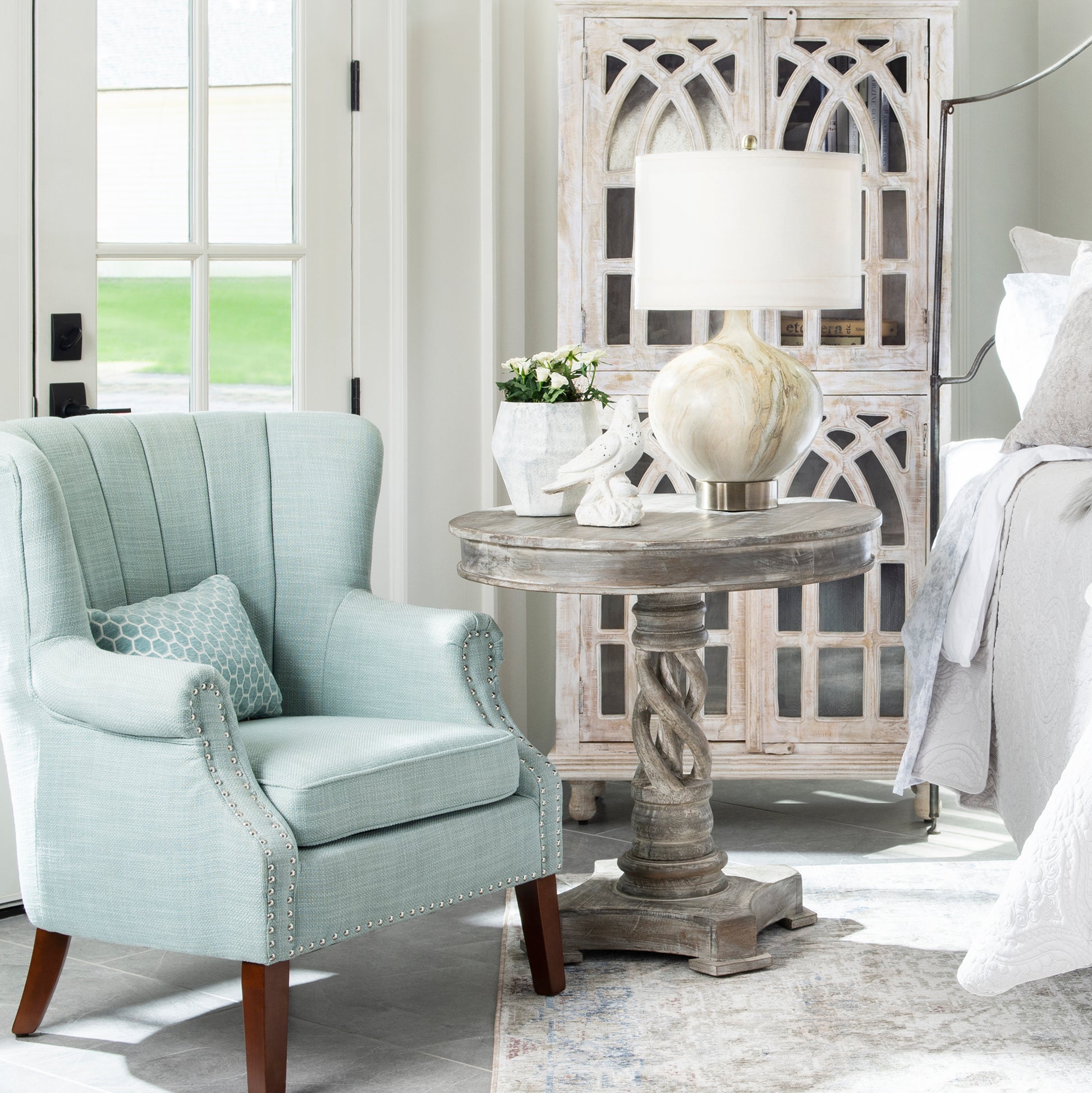 gray canvas accent table in a transitional living room setting