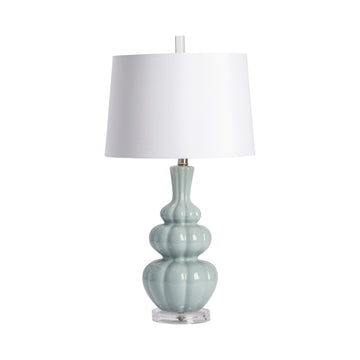 white brushed table lamp in a farmhouse contemporary bedroom setting