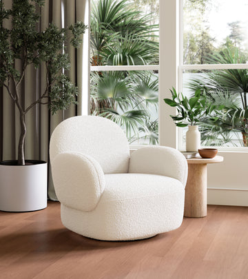 cream woven accent chair in a minimalist dining room setting
