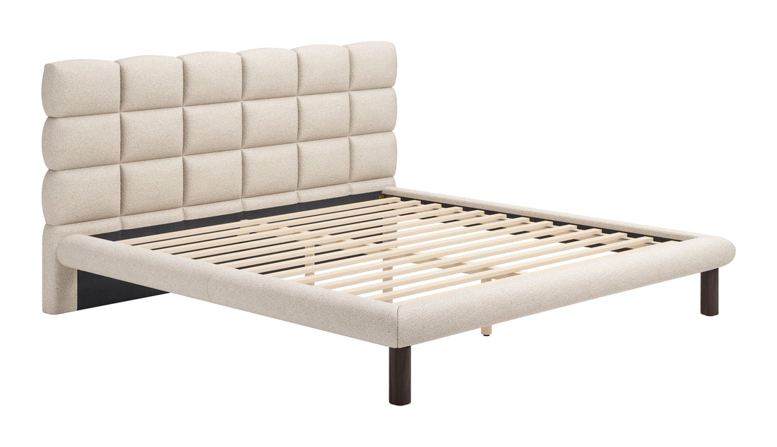 warm-toned brushed metal bed frame styled in a mid-century minimalist entryway