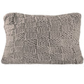 Natural knit wool blend Dutch Euro pillow in a rustic bedroom setting