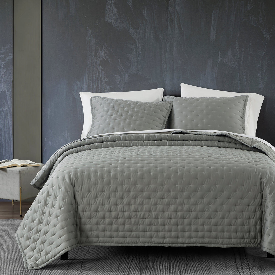earth-toned textured quilt in a farmhouse cozy bedroom setting