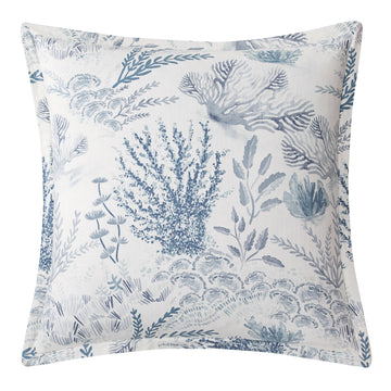 earth-toned textured pillow sham in a minimalist guest room setting