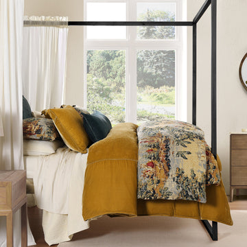 earth-toned textured comforter set in a contemporary master bedroom setting