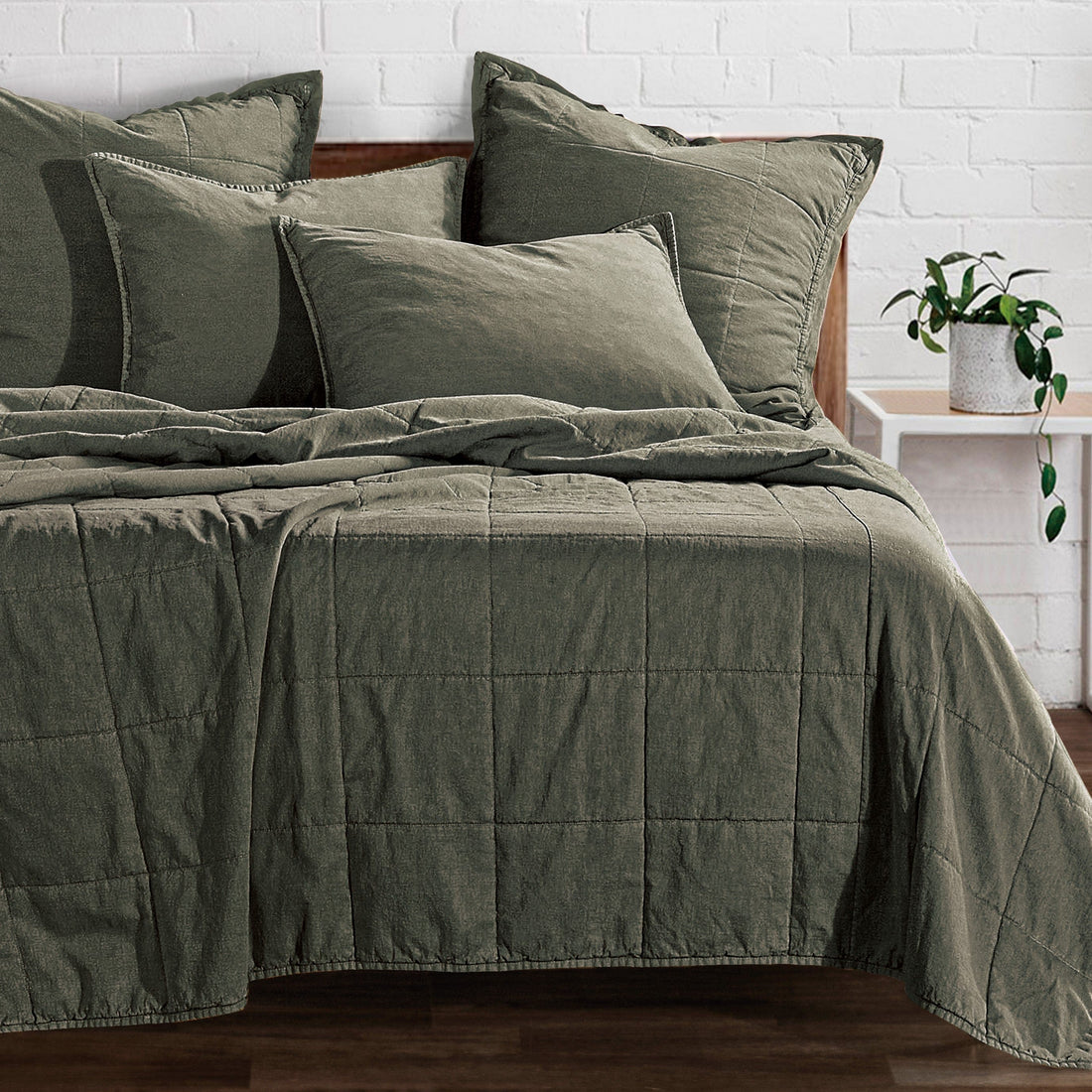 warm-toned plush home décor piece in a elegant modern bedroom setting