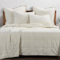 warm-toned plush home décor piece in a elegant modern bedroom setting