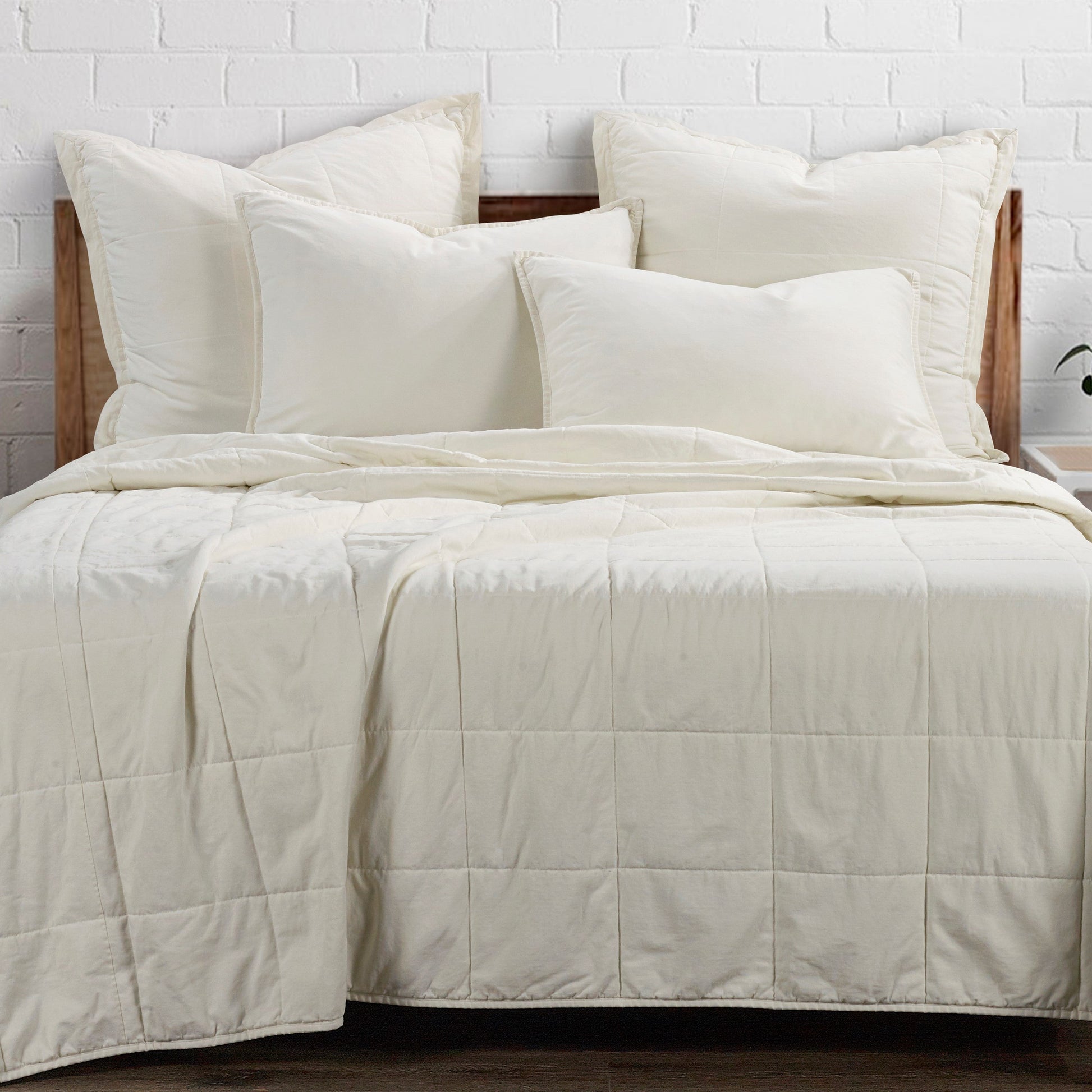 warm-toned plush home décor piece in a elegant modern bedroom setting