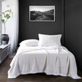 warm-toned plush home décor piece in a contemporary master bedroom setting