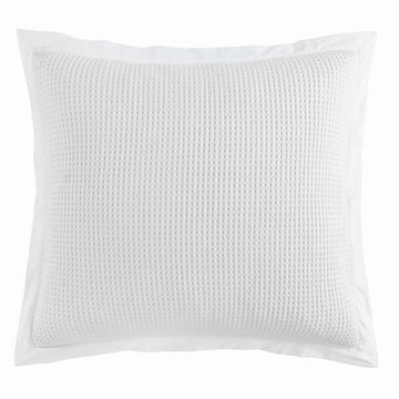 warm-toned plush pillow sham in a classic contemporary bedroom setting