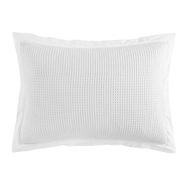 Stonewashed Cotton Waffle Weave Pillow Sham Set styled for a transitional bedroom space.