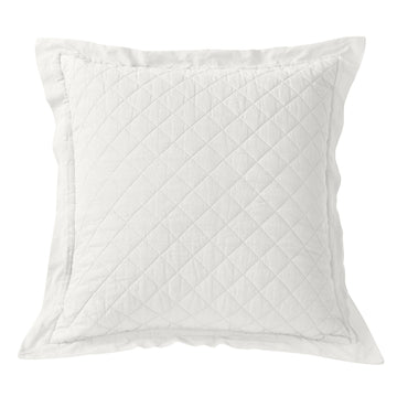 cream woven pillow sham in a refined living room setting