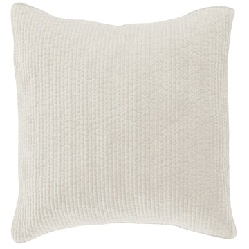 warm-toned plush pillow sham in a contemporary master bedroom setting