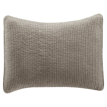 Stonewashed Cotton Velvet Quilted Pillow Sham styled for a transitional bedroom space.