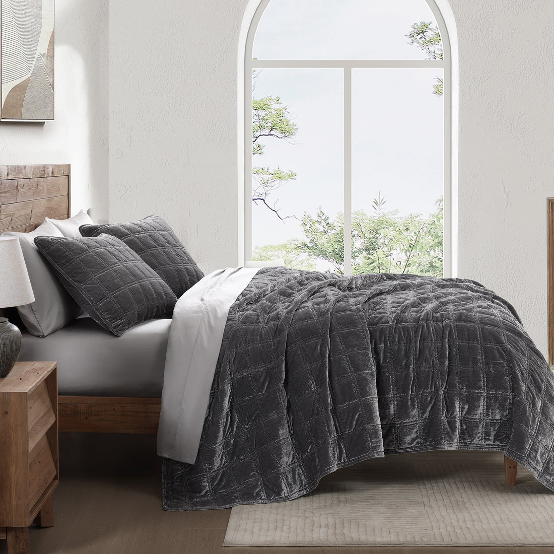 earth-toned textured quilt in a minimalist guest room setting