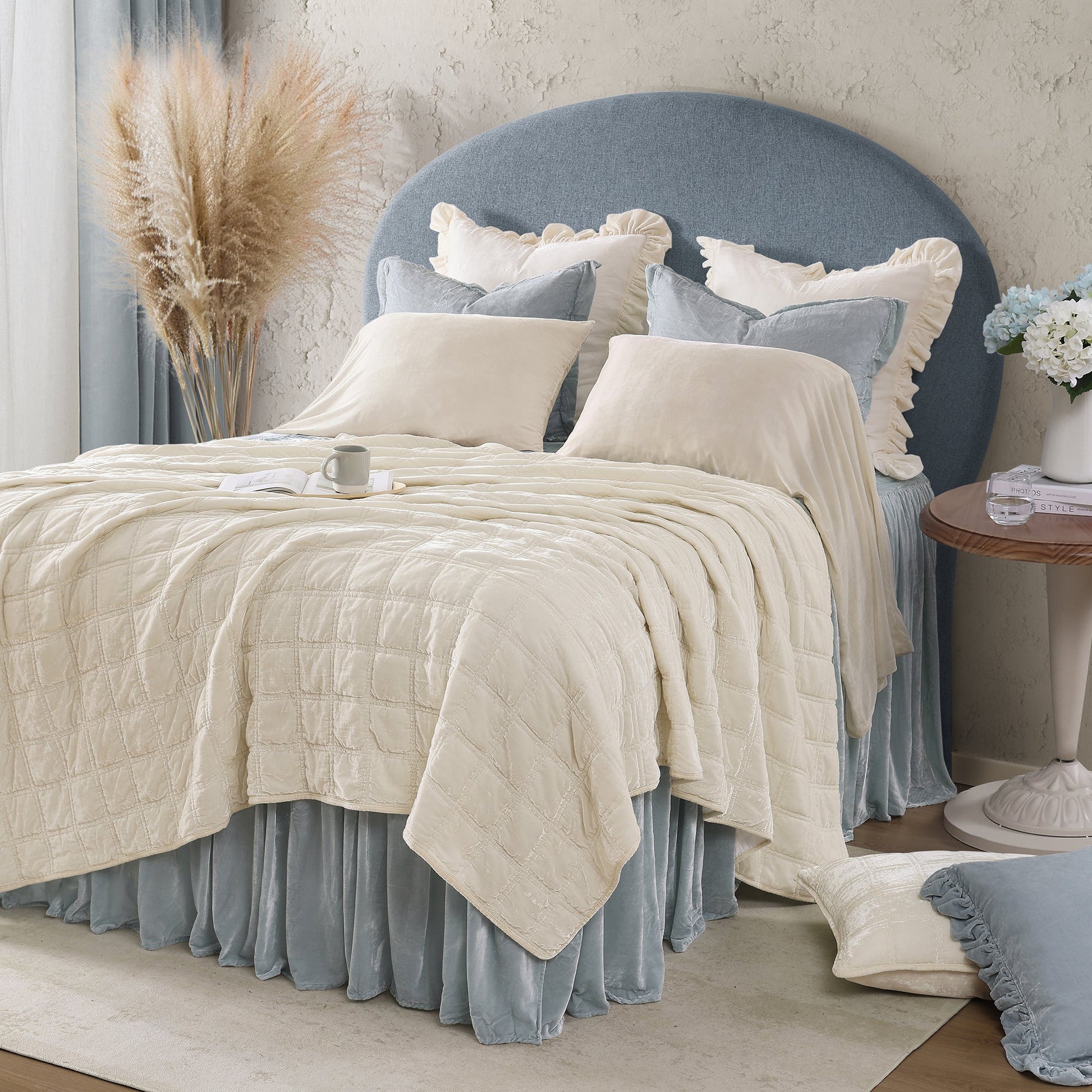 earth-toned textured quilt in a minimalist guest room setting