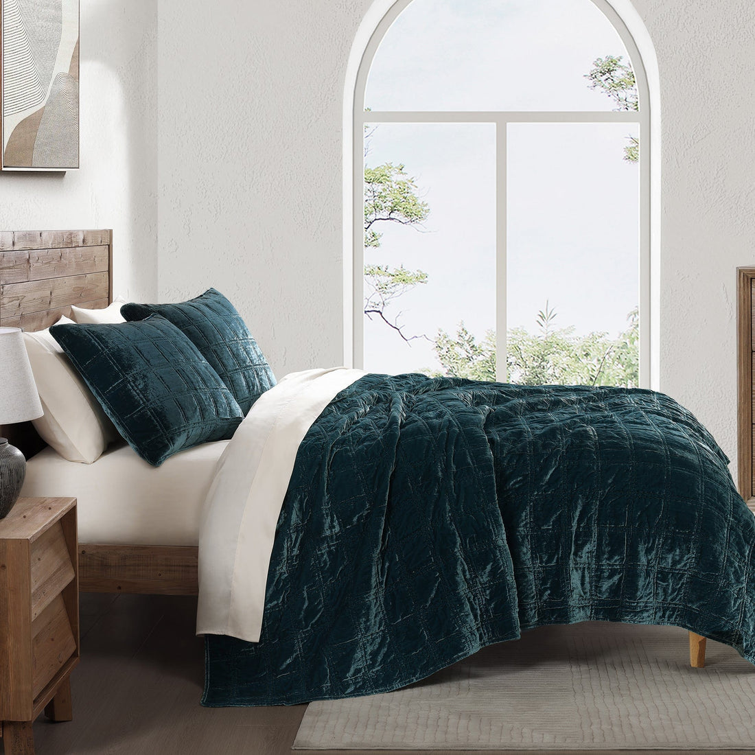 gray cotton quilt in a minimalist guest room setting