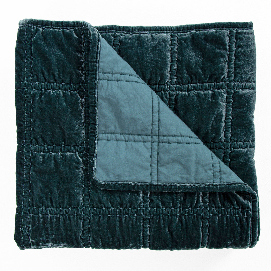 white brushed throw in a elegant modern bedroom setting