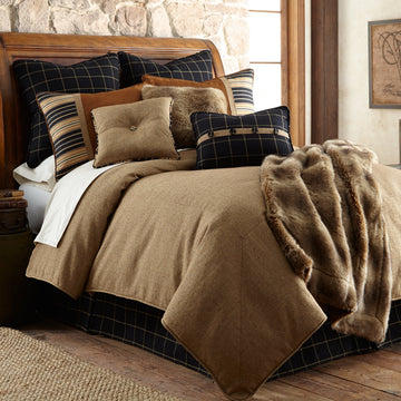 charcoal textured comforter set in a minimalist dining room setting