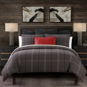 earth-toned fabric comforter set in a elegant modern bedroom setting