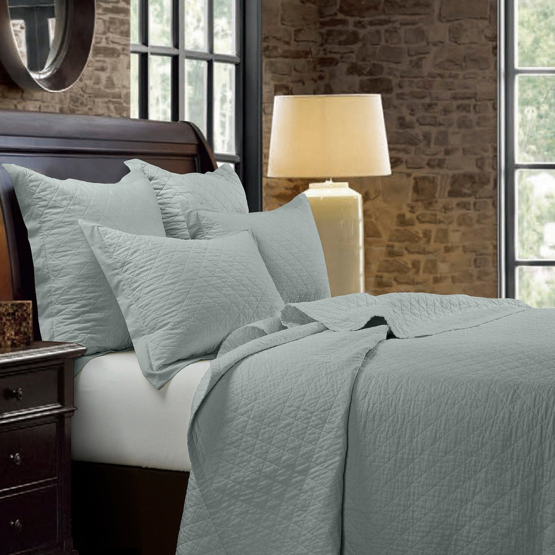 charcoal textured quilt in a transitional living room setting