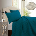 charcoal textured quilt in a farmhouse contemporary bedroom setting